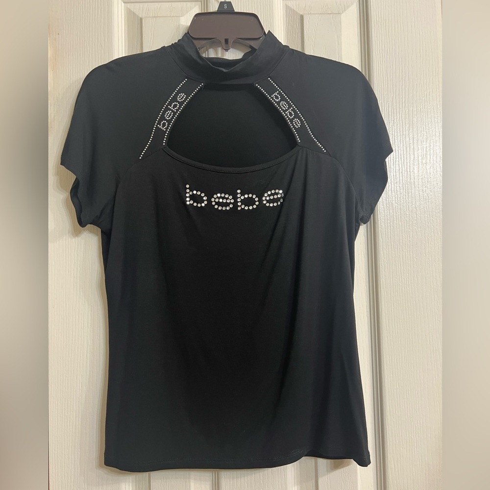 Like new Bebe women’s rhinestone logo top size L